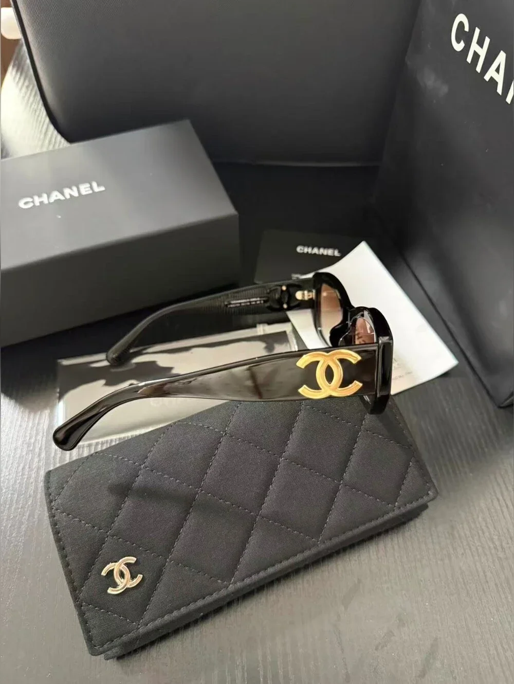 CHANEL Black Frame Sunglasses with Brown Gradient Lenses